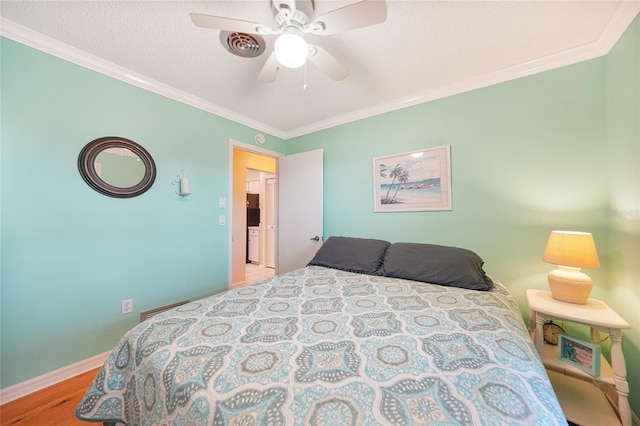 7453 Spinnaker Blvd, Englewood, FL 34224 - bedroom with crown molding, wood finished floors, and a ceiling fan