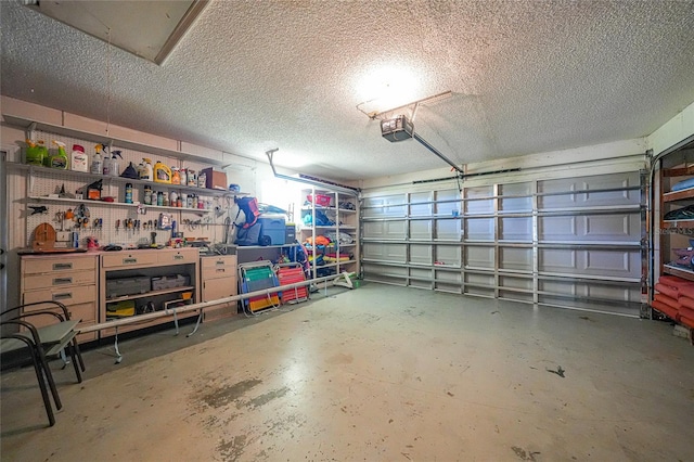 7453 Spinnaker Blvd, Englewood, FL 34224 - garage featuring a garage door opener and a workshop area