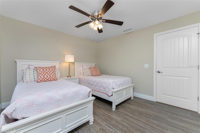 184 Spring Dr, Rotonda West, FL 33947 - bedroom featuring wood finished floors and ceiling fan