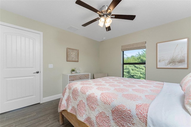 184 Spring Dr, Rotonda West, FL 33947 - bedroom featuring wood finished floors and ceiling fan