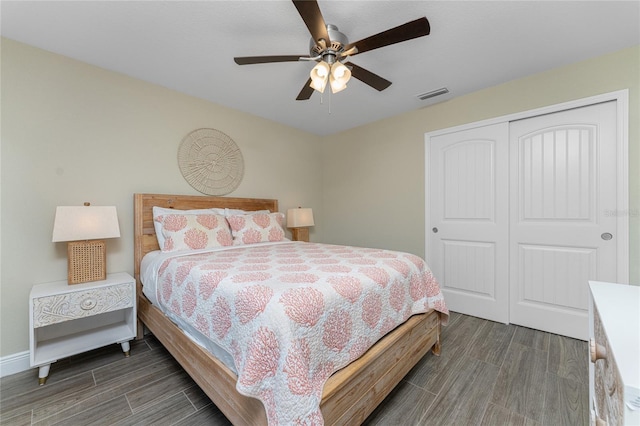 184 Spring Dr, Rotonda West, FL 33947 - bedroom featuring wood finished floors, a closet, and ceiling fan