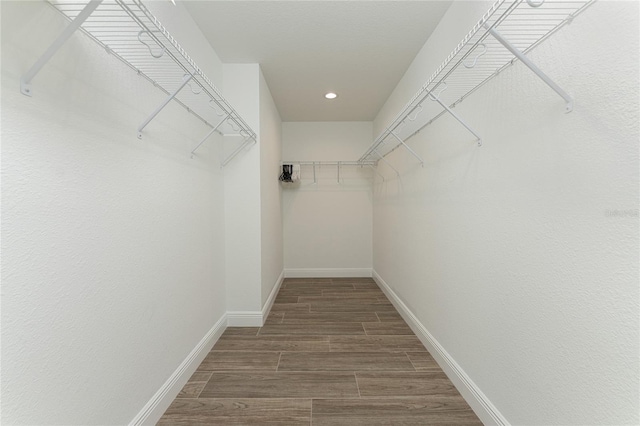 184 Spring Dr, Rotonda West, FL 33947 - spacious closet with wood finished floors