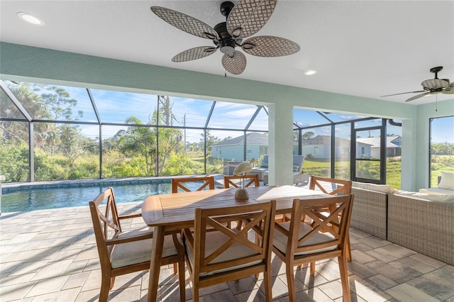 184 Spring Dr, Rotonda West, FL 33947 - sunroom / solarium featuring a ceiling fan, a pool, and outdoor lounge area