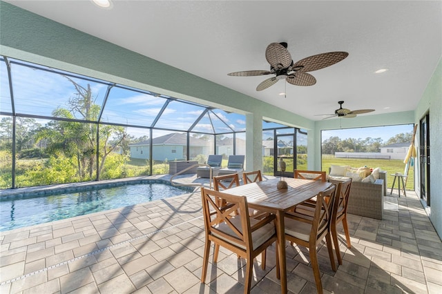 184 Spring Dr, Rotonda West, FL 33947 - sunroom / solarium featuring an outdoor hangout area, a swimming pool, and ceiling fan