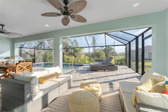 184 Spring Dr, Rotonda West, FL 33947 - sunroom featuring a ceiling fan and outdoor lounge area