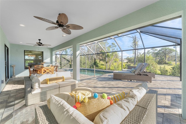 184 Spring Dr, Rotonda West, FL 33947 - view of patio / terrace featuring an outdoor living space, a ceiling fan, an outdoor pool, and glass enclosure