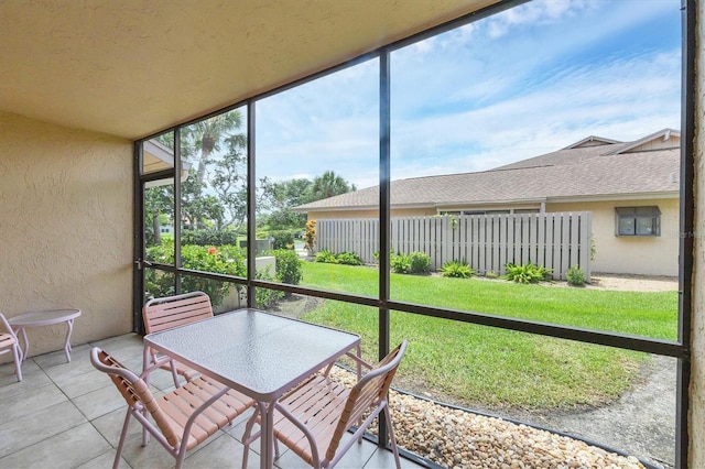 2004 Longpointe Cir Unit E2, Venice, FL 34293 - sunroom / solarium with outdoor dining space