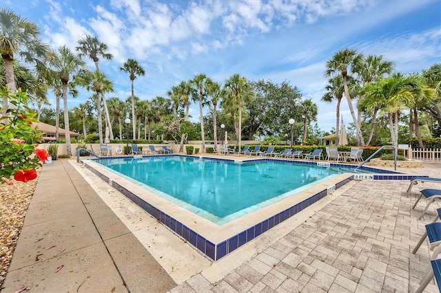 2004 Longpointe Cir Unit E2, Venice, FL 34293 - community pool featuring a patio area