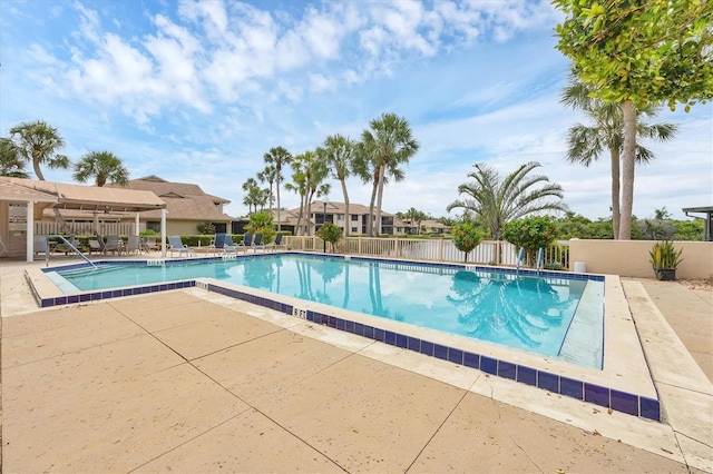 2004 Longpointe Cir Unit E2, Venice, FL 34293 - community pool featuring a patio area