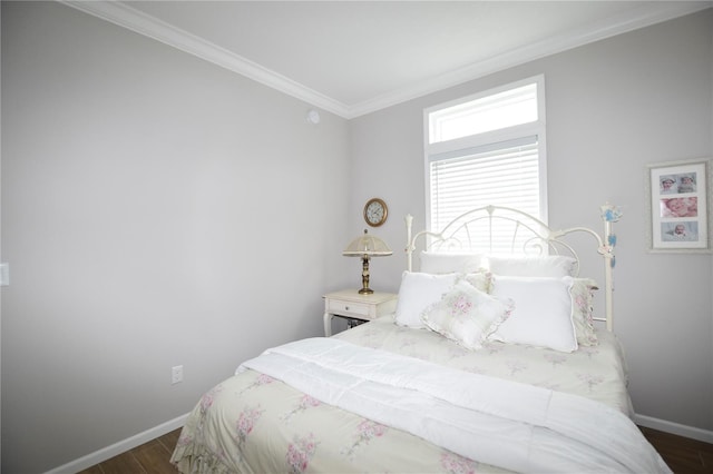 4354 Manatee Loop Unit 16A, Punta Gorda, FL 33950 - bedroom featuring dark wood-style flooring and crown molding
