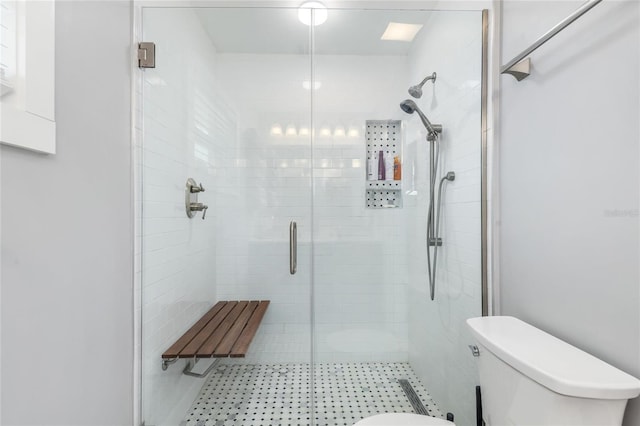 141 Baldwin Ct SE, Port Charlotte, FL 33952 - bathroom with toilet and a stall shower
