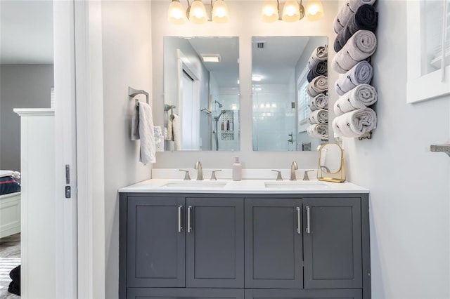141 Baldwin Ct SE, Port Charlotte, FL 33952 - bathroom featuring double vanity and tiled shower
