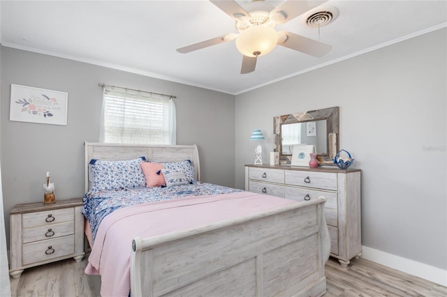141 Baldwin Ct SE, Port Charlotte, FL 33952 - bedroom with light wood finished floors, ornamental molding, and a ceiling fan
