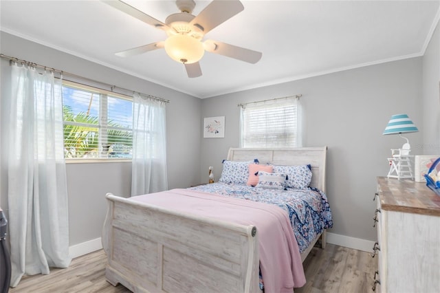 141 Baldwin Ct SE, Port Charlotte, FL 33952 - bedroom with light wood-type flooring, ornamental molding, and ceiling fan