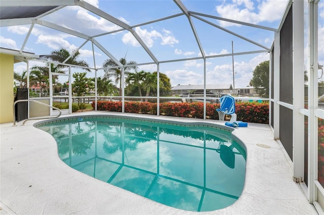 141 Baldwin Ct SE, Port Charlotte, FL 33952 - outdoor pool featuring a patio and a lanai
