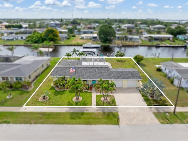 141 Baldwin Ct SE, Port Charlotte, FL 33952 - view from above of property with property parcel outlined and a large body of water