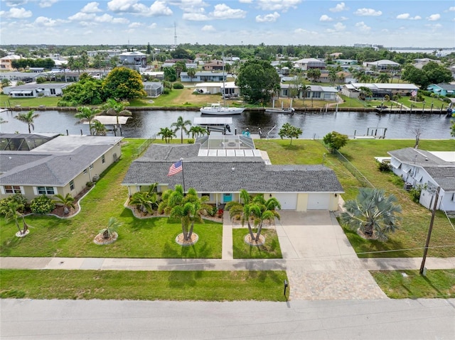 141 Baldwin Ct SE, Port Charlotte, FL 33952 - aerial view of residential area featuring a nearby body of water