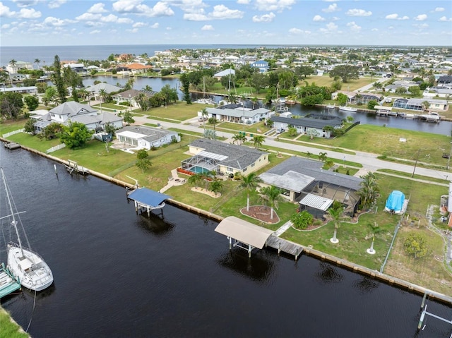 141 Baldwin Ct SE, Port Charlotte, FL 33952 - aerial perspective of suburban area featuring a nearby body of water