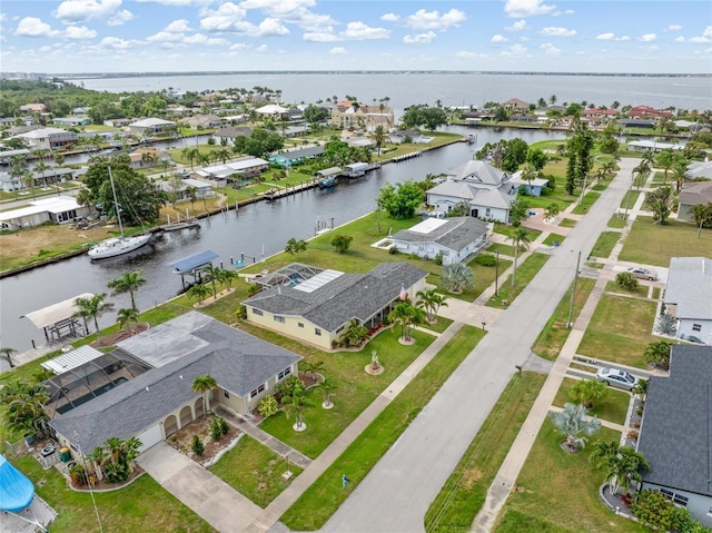 141 Baldwin Ct SE, Port Charlotte, FL 33952 - aerial perspective of suburban area with a large body of water