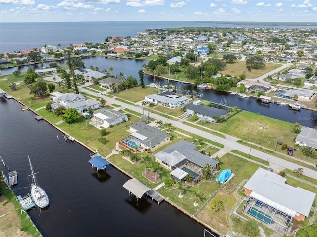 141 Baldwin Ct SE, Port Charlotte, FL 33952 - aerial overview of property's location featuring a large body of water and nearby suburban area