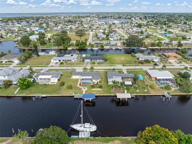 141 Baldwin Ct SE, Port Charlotte, FL 33952 - aerial view of residential area featuring a large body of water