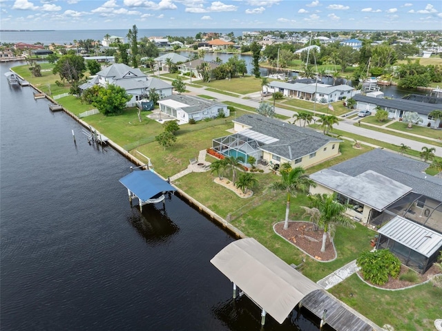 141 Baldwin Ct SE, Port Charlotte, FL 33952 - aerial perspective of suburban area featuring a large body of water