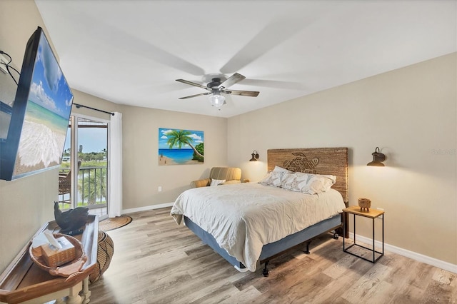 1401 S Mccall Rd Unit 205B, Englewood, FL 34223 - bedroom with wood finished floors and a ceiling fan