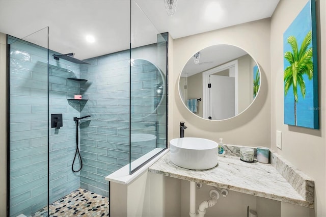 1401 S Mccall Rd Unit 205B, Englewood, FL 34223 - bathroom featuring a sink and a walk in shower