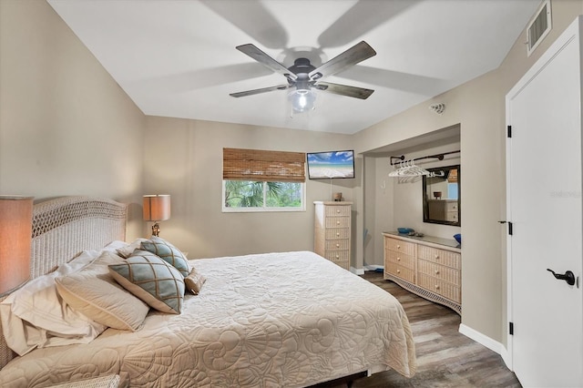 1401 S Mccall Rd Unit 205B, Englewood, FL 34223 - bedroom featuring wood finished floors and a ceiling fan