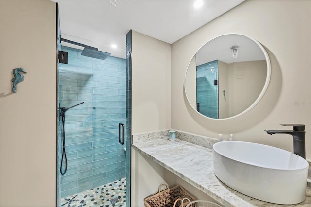 1401 S Mccall Rd Unit 205B, Englewood, FL 34223 - bathroom with a stall shower, vanity, and recessed lighting