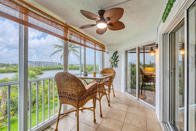 1401 S Mccall Rd Unit 205B, Englewood, FL 34223 - sunroom / solarium with a water view and a ceiling fan