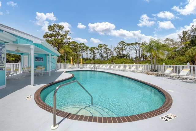 1401 S Mccall Rd Unit 205B, Englewood, FL 34223 - community pool featuring a patio and a ceiling fan
