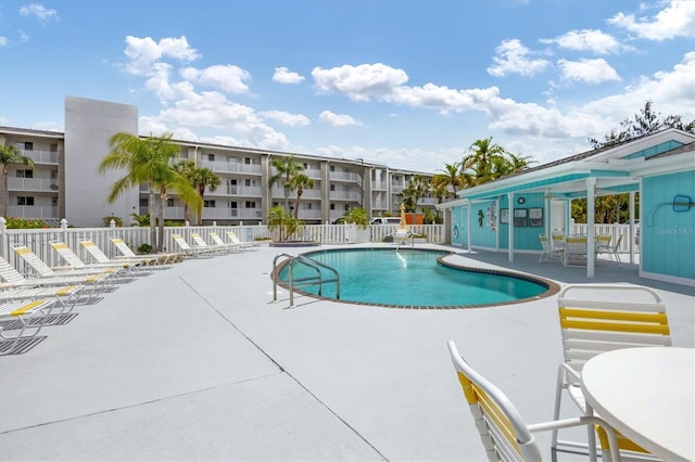 1401 S Mccall Rd Unit 205B, Englewood, FL 34223 - community pool with a patio area