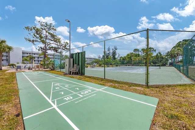 1401 S Mccall Rd Unit 205B, Englewood, FL 34223 - surrounding community with shuffleboard and a tennis court