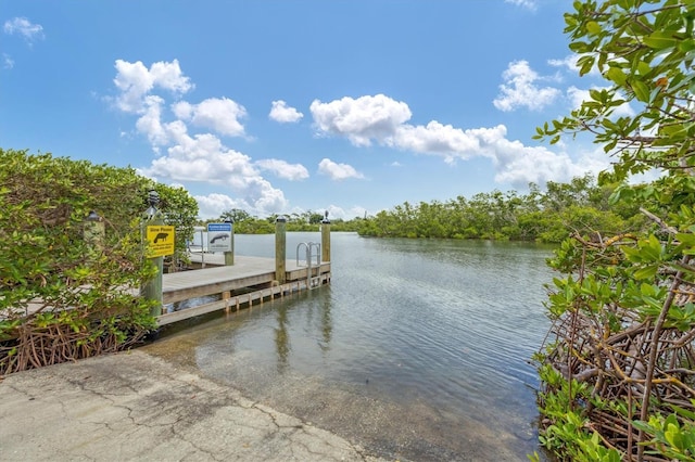 1401 S Mccall Rd Unit 205B, Englewood, FL 34223 - dock featuring a water view