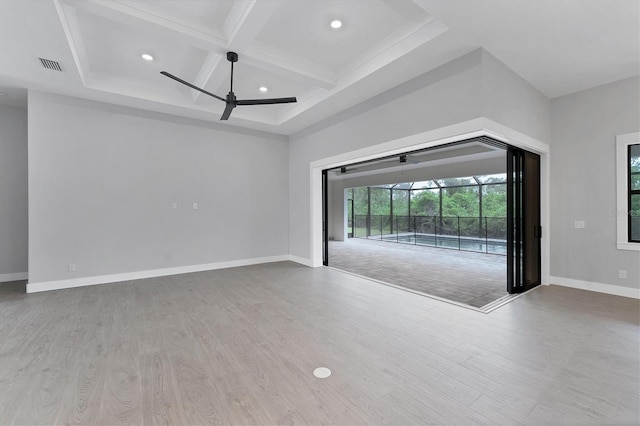 14089 Wenzel Ave, Port Charlotte, FL 33981 - spare room featuring a ceiling fan, wood finished floors, beam ceiling, coffered ceiling, and recessed lighting