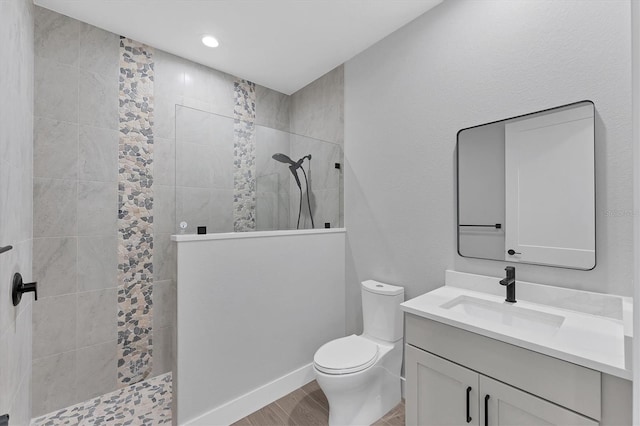 14089 Wenzel Ave, Port Charlotte, FL 33981 - full bath with a walk in shower, vanity, wood finished floors, and recessed lighting