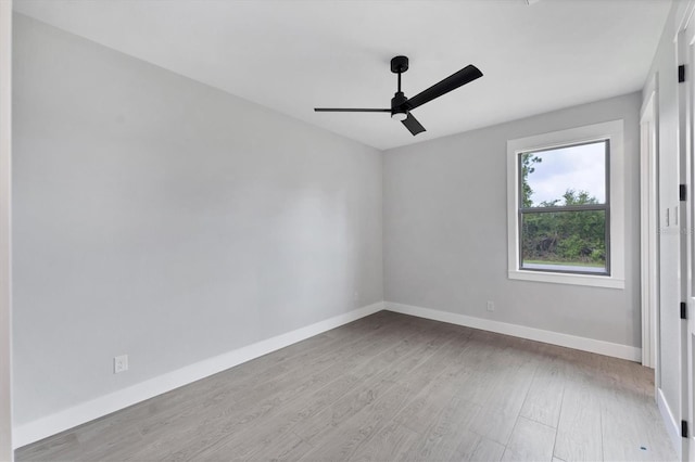 14089 Wenzel Ave, Port Charlotte, FL 33981 - spare room with ceiling fan and wood finished floors