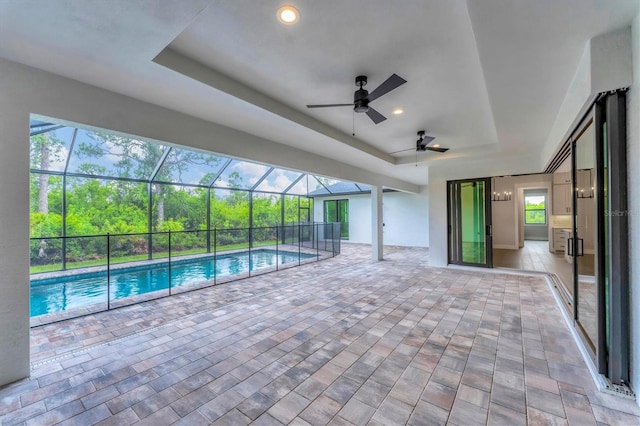 14089 Wenzel Ave, Port Charlotte, FL 33981 - outdoor pool with a patio area, a ceiling fan, and glass enclosure