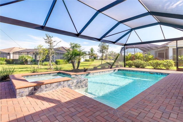 14756 Ponce De Leon Trl, Port Charlotte, FL 33981 - view of swimming pool featuring a lawn, glass enclosure, a pool with connected hot tub, and a patio area