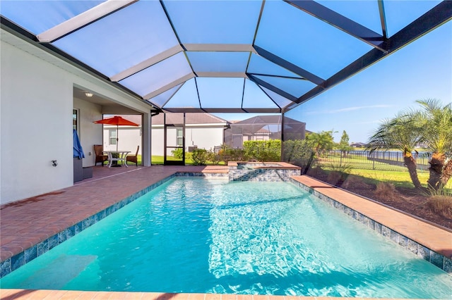 14756 Ponce De Leon Trl, Port Charlotte, FL 33981 - view of pool featuring a patio, glass enclosure, and a pool with connected hot tub