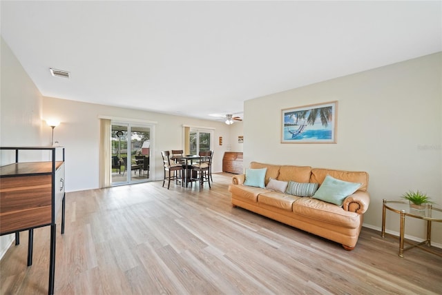 7580 Hanchey St, North Port, FL 34287 - living room featuring light wood-type flooring and ceiling fan