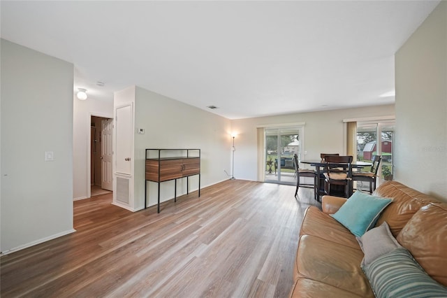 7580 Hanchey St, North Port, FL 34287 - living area featuring wood finished floors