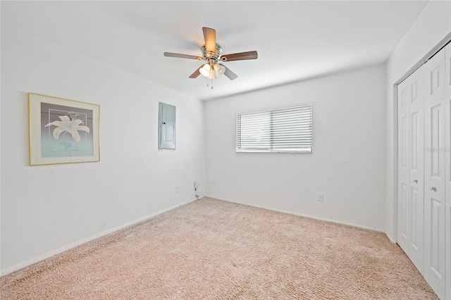 7580 Hanchey St, North Port, FL 34287 - unfurnished bedroom with carpet flooring, electric panel, a closet, and a ceiling fan