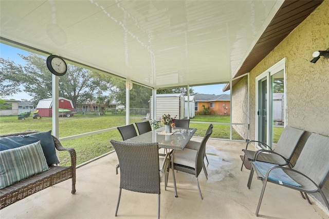 7580 Hanchey St, North Port, FL 34287 - sunroom / solarium featuring outdoor dining space