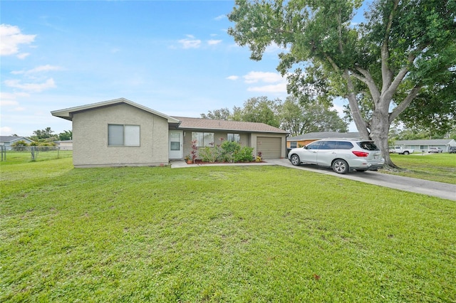 7580 Hanchey St, North Port, FL 34287 - ranch-style home with driveway, a garage, and stucco siding