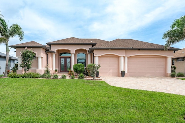1131 Rotonda Cir, Rotonda West, FL 33947 - view of front of house featuring french doors, a garage, stucco siding, driveway, and a front yard