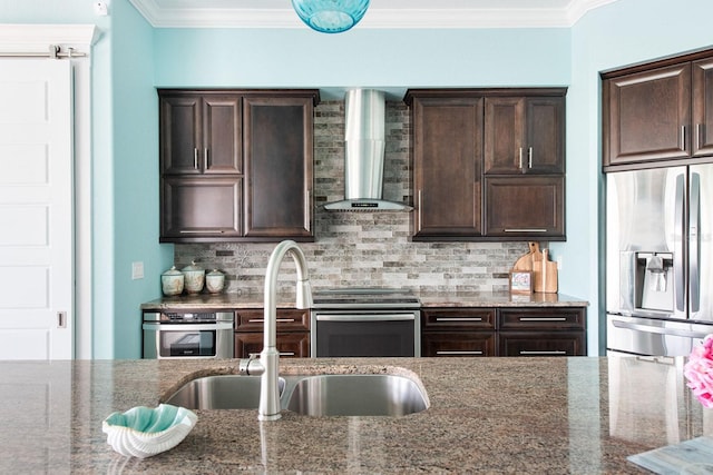 1131 Rotonda Cir, Rotonda West, FL 33947 - kitchen with appliances with stainless steel finishes, wall chimney exhaust hood, dark brown cabinetry, ornamental molding, and tasteful backsplash