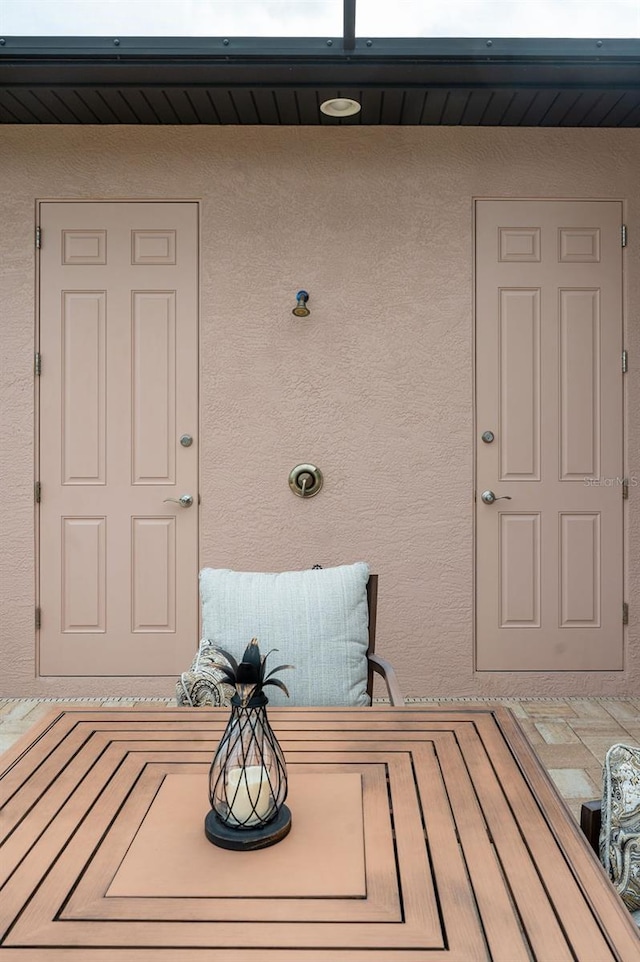1131 Rotonda Cir, Rotonda West, FL 33947 - entrance to property featuring stucco siding