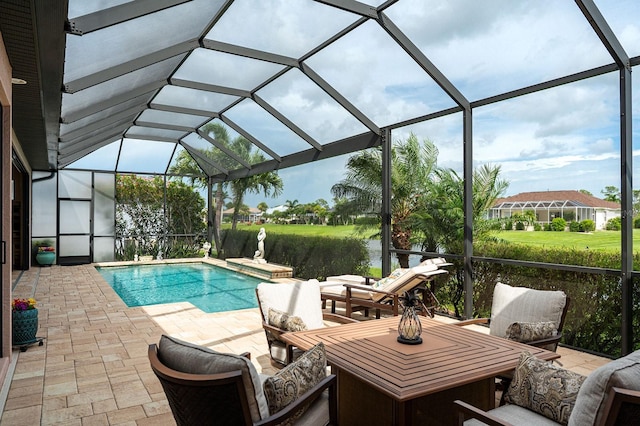 1131 Rotonda Cir, Rotonda West, FL 33947 - outdoor pool featuring a patio area and glass enclosure